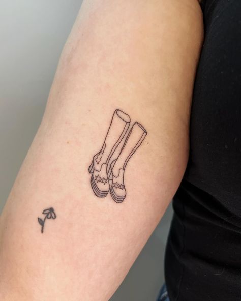 handpoked custom design for Annabelle! the coolest gogo boots 🌟 next to a healed flower from a few months ago 🙃 this was so fun dm or use the link in my bio to book your custom or flash tattoo :) !! @harmlesstattoo Braintree, Essex #abbatattoo #gogoboottattoo #finelinetattoo #cutetattoo #smalltattoo #handpokedtattoo #sticknpoke #handpoke #essextattoo #hertfordshiretattoo #suffolktattoo #handpokeartist Gogo Boots Tattoo, Ciggerate Tattoo, Boots Tattoo, Boot Tattoo, Stick N Poke, Hand Poked Tattoo, Hand Poke, Gogo Boots, Fine Line Tattoos