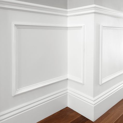 Corners are often overlooked. But they hold incredible potential to transform a space. By adding wainscoting to these small, seemingly insignificant areas, you can bring an entirely new dimension to your home. Wainscoting isn’t just for large, open walls it’s for those tucked-away nooks and narrow passages too. When you add wainscoting to a corner, it turns that simple space into a feature. The crisp lines and angles of wainscoting give corners definition, making them feel intentional an... Colonial Foyer, Waynes Coating, New England Colonial, Wainscoting Styles, Lines And Angles, Open Wall, New Dimension, Hallway Ideas, Wainscoting