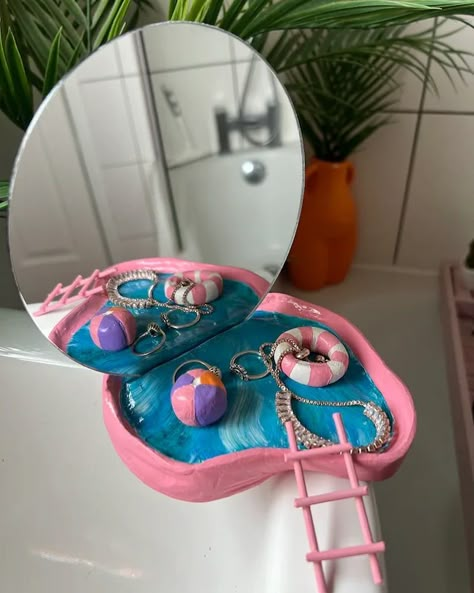 I’ll just be over here creating cool decor that nobody asked for 😅🩵🩷 the swimming pool mirror is one of my favourite clay pieces I’ve made😍 #clay #clayart #airdryclay #mirror #bathroomdecor #pinkdecor #ringdish #handmade #handpainted Swimming Pool Clay Tray, Clay Swimming Pool, Clay Mirror Diy, Clay Mirror, Polymer Clay Decor, Pottery Party, Preppy Birthday, Ceramic Creations, Nobody Asked