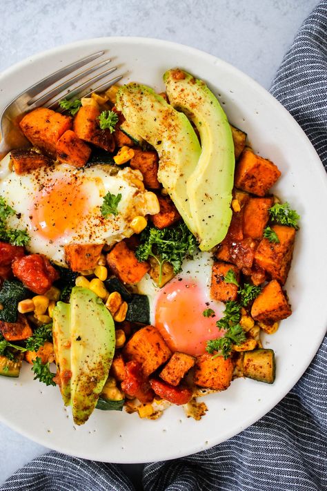 This Healthy Taco Breakfast Skillet is packed with veggies and protein for an easy, nutritious one-pan meal. It’s made with sweet potatoes, zucchini, corn, eggs, and taco seasoning. Gluten-free, with vegetarian and vegan options available! #breakfastskillet #sweetpotato #eggs Taco Breakfast, Healthy Taco, Zucchini Corn, Breakfast Skillet, Healthy Tacos, Cooking Sweet Potatoes, Savory Breakfast, Vegan Options, Taco Seasoning