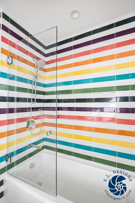 A kids bathroom designed by E.L. Designs in Aptos California shows the close up of the bath/shower. The walls are glossy, rainbow tiles that are vibrant and clean. Colourful Subway Tile Bathroom, Fun Kids Bathroom Modern, Rainbow Bathroom Tile, Rainbow Bathroom Kids Target, Fun Kids Bathroom, Aptos California, Rainbow Bathroom, Ge Cafe Appliances, Subway Tile Colors