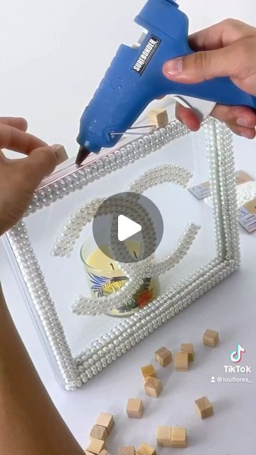 Lou Flores on Instagram: "Chanel Decoration DiY💕  Tag your friends & comment  #diy #chanel #makeup" Diy Chanel Decor, Diy Chanel Decor Dollar Stores, Diy Chanel Candle, Chanel Decoration, Chanel Candles, Lou Flores, Diy Tag, Chanel Decor, Dollar Store Diy Projects