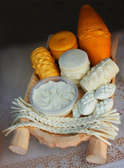 A Polish Smoked Cheese Oscypek is a very old sheep's cheese produced by shepherds living in the Tatra mountains. Polish Cheese, Cheese Names, Poland Food, Polish Mountains, Sheep Milk, Cow's Milk, Sheep Cheese, Polish Traditions, Smoked Cheese