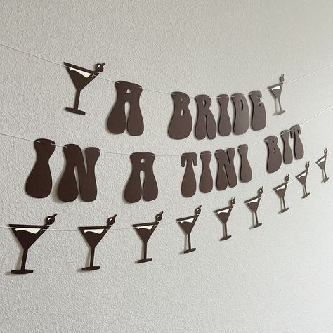 Raise a toast to the bride with our espresso martini-themed 'A Bride in a Tini Bit' banner! 🍸💍 Perfect for adding a touch of sophistication and fun to bachelorette parties or bridal showers. Celebrate the bride-to-be with a blend of elegance and excitement! 🎉✨ #BrideInATiniBit #EspressoMartini #BridalShower #CelebrateInStyle Scorpio Party Decorations, 28th Birthday Ideas, 30th Birthday Ideas, Martini Party, 30th Bday Party, 30th Birthday Bash, Thirty Flirty And Thriving, Themed Bachelorette Party, Bachelorette Party Banners