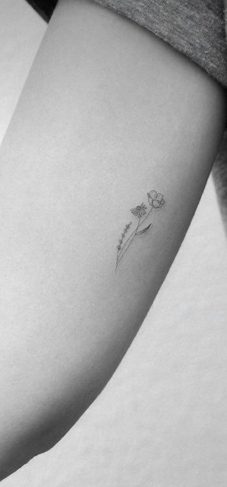 Floral Dainty Tattoo, Small Flower Tattoos On Arm, Birth Flower With Initial Tattoo, Subtle Flower Tattoo, Tattoos To Get For Your Sister, Small Dainty Daffodil Tattoo, Birth Flower Tattoos Simple, Daisy Haites Tattoo, Buttercup Flower Tattoo Simple