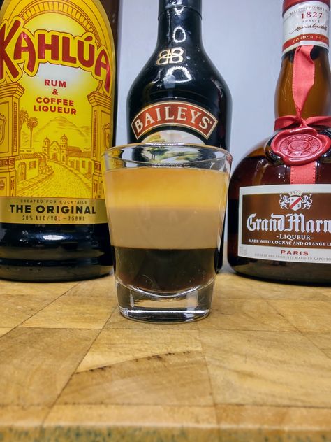 The Ultimate B-52 Shot: A layered surprise | Occasional Cocktails Toasted Almond Drink, Kahlua Hot Chocolate, Strawberry Shots, Kahlua And Cream, Tequila Rose, Brandy Cocktails, Cocktail Shots, After Dinner Drinks, Creamy Coffee