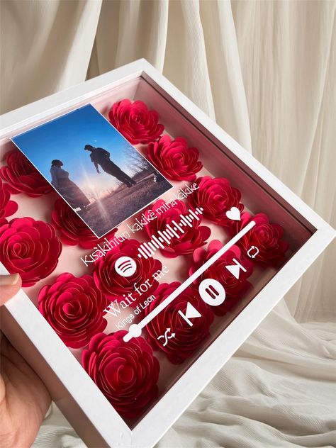 Create a stunning, one-of-a-kind keepsake with our handmade Spotify Flower Shadow Box! Crafted from premium cardstock designed to last a lifetime, this piece makes a heartfelt gift for weddings, anniversaries, birthdays, and home decor. 🎵 How It Works: Send us the photo you would like placed on the glass frame, along with the song name & artist. We'll generate a scannable Spotify code and add it to the glass frame as well! 🌸 Flower Color Options: 🌺Ombre (Default): Light to dark (6 shades) -Dark to Light: Note in personalization (e.g., "Pink ombre - dark to light") 🌺Assorted: Mix up to 6 shades (e.g., "Pink 1, White, Red 2") 🌺Solid: One color only (e.g., blue #3) ✔Frame Size is standard 8x10 inches ✔Font style is standard ✔ Vinyl color (text & design) will be Black or White - We will c Song Picture, Ombre Dark, Flower Shadow, Shadow Frame, Spotify Code, Song Name, Flower Shadow Box, Picture Gifts, Color Text