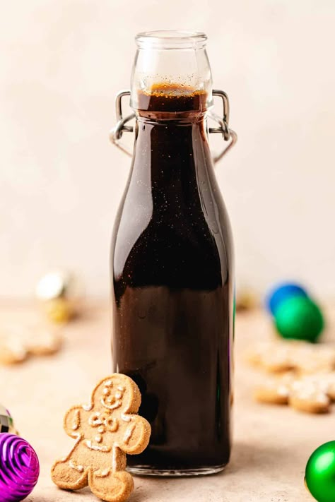 Gingerbread Syrup is your key to unlocking festive flavors this holiday season. This homemade syrup, rich with warm spices, molasses and dark brown sugar, will add a delicious splash of gingerbread flavor to your cocktails, lattes, pancakes and baked goods. Homemade Coffee Syrup | Homemade Recipes | Coffee Syrups | Homemade Drinks | Homemade Simple Syrup | Holiday Recipes | Christmas Recipes | Diy Brown Sugar Syrup, Gingerbread Syrup Recipe, Gingerbread Simple Syrup, Christmas Coffee Syrup, Gingerbread Syrup For Coffee, Brown Sugar Coffee Syrup Recipe, Christmas Syrup, Gingerbread Coffee Syrup, Coffee Syrup Recipe