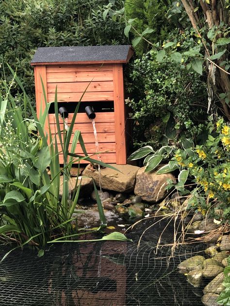 I used a compost bin to hide my pond filter. I used large diameter bamboo to conceal the pipes. Pond Filter Cover Ideas, Irrigation Pumps, Outdoor Painting, Patio Pond, Diy Pond, Pond Ideas, Pond Filters, Pond Pumps, Water Gardens