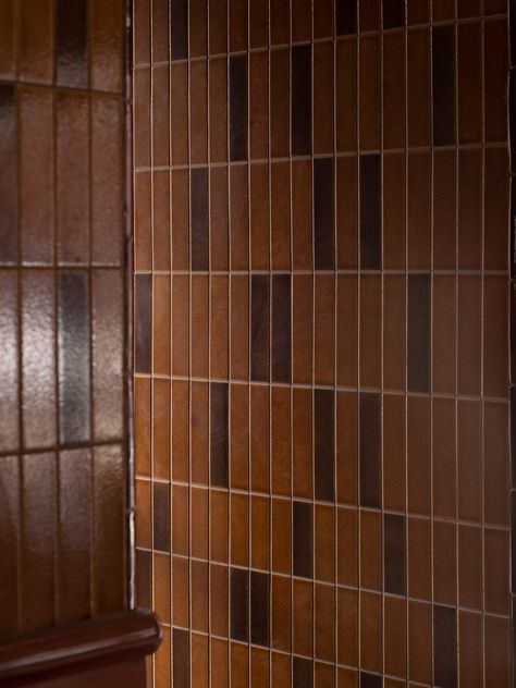 Inside, the architects have created a richly detailed yet inviting space that channels the classic Australian pub through materiality and tone. A muted colour palette of ochre, brown and dusty pink coats the space alongside tiled walls and polished timber, and the floor features art deco otifs. #australiandesign #hotelinterior #architecture #archdaily #architectureporn #artdeco #tiles #interiorgoals #interiordesign #australianarchitecture #architecturelovers Richards Stanisich, Pub Interior Design, Bar Tile, Warehouse Apartment, Art Deco Floor, Brown Tile, Pub Interior, Art Deco Tiles, Exterior Tiles