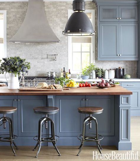 beautiful masculine kitchen by Parrish Chilcoat & Joe Lucas featured in House Beautiful.  Love the two tones of gray from Farrow & Ball's Down Pipe, to Benjamin Moore's Chelsea gray on the island.  The vintage stools, industrial pendant fixture, and the acid washed seagrass limestone backsplash are simply gorgeous! Blue Gray Kitchen Cabinets, Grey Blue Kitchen, Серая Кухня, Kabinet Dapur, Blue Kitchen Cabinets, Herringbone Backsplash, Blue Cabinets, Classic Kitchen, Grey Kitchen Cabinets