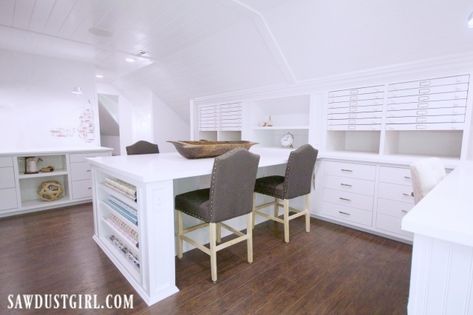 This amazing craft room has TONS of functional space with four designated work stations and more storage than a person will probably ever utilize. Craft Room Ideas On A Budget, Sawdust Girl, Long Floating Shelves, Space Organization, Bookcase Door, Dream Craft Room, Craft Room Design, Craft Space, Island Countertops