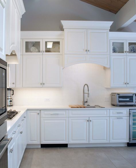 There are disadvantages to kitchen cabinets that are too high. Learn the right height to maximize storage and usefulness. Kitchen Cabinets To The Ceiling, Kitchen Trim, Cabinets To The Ceiling, Cheap Backsplash, Kitchen Cabinets To Ceiling, Cabinets To Ceiling, Vaulted Ceiling Kitchen, Kitchen Cabinet Inspiration, Trim Ideas