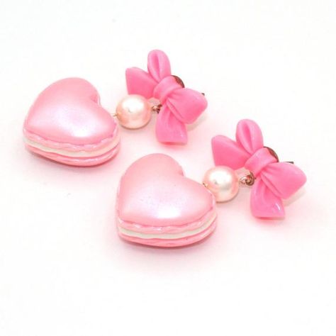 These adorable earrings are perfect for Valentine's Day or anytime of the year! Pastel pearl finish heart shaped macaron charms filled with whipped cream hung below pink bow posts with glass pearls. Posts are hypoallergenic surgical steel. Choose pink, purple or mint green. Charms are about 1" wide. Total earring length: about 2". Matching necklaces and rings in my shop>> https://etsy.com/shop/fatallyfeminine**Made to order - please allow 2 weeks for your item to be made before shipment**E Kawaii Jewelry Aesthetic, Valentine’s Day Jewelry, Pink Accessories Aesthetic, Valentines Day Accessories, Candy Accessories, Pink Pins, Valentines Day Earrings, Pastel Jewelry, Candy Earrings