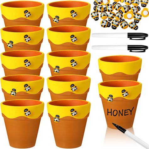 PRICES MAY VARY. Unleash Your Creativity with DIY Set: the package includes 12 terracotta honey bee pots, 24 bee decorations, and 2 markers in black, ideal for DIY some gift, bringing out your artistic side to create unique vibrant displays, adding fun to your bee party, birthday parties, baby showers Ideal Decorations for Special Events: the terracotta pots can be applied to a bee themed party or other special event; They are designed with irregular yellow edges, it looks like honey overflows; Bee Gifts Diy, Bee 3rd Birthday Party, Bee Shower Ideas, Bee Centerpiece Ideas, Diy Bee Decor, Bumble Bee Baby Shower Ideas, Tearoom Ideas, Yellow Wedding Favors, Bees Diy