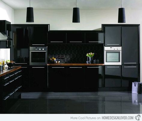 Want high-gloss cabinets like these? Choose RAUVISIO brilliant surfaces. Mirror like reflective quality and double sided gloss. | https://www.rehau.com/us-en/furniture/surfaces/rauvisio-brilliant | That's modern done right. Black Gloss Kitchen, High Gloss Kitchen Cabinets, Gloss Kitchen Cabinets, Black Kitchen Design, Modern Black Kitchen, High Gloss Kitchen, Gloss Kitchen, Black Kitchen Cabinets, Kitchen Gallery