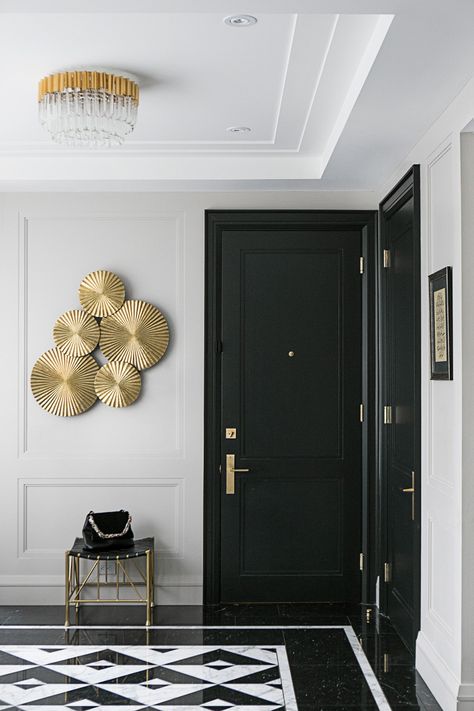 Toronto's Premier Architecture and Interior Design Firm | LA DOLCE VITA | 1 White Staircase, Foyer Ideas, White Molding, Black Interior Doors, Light Hardwood Floors, Light Grey Walls, Foyer Design, Beige Walls, Black Doors