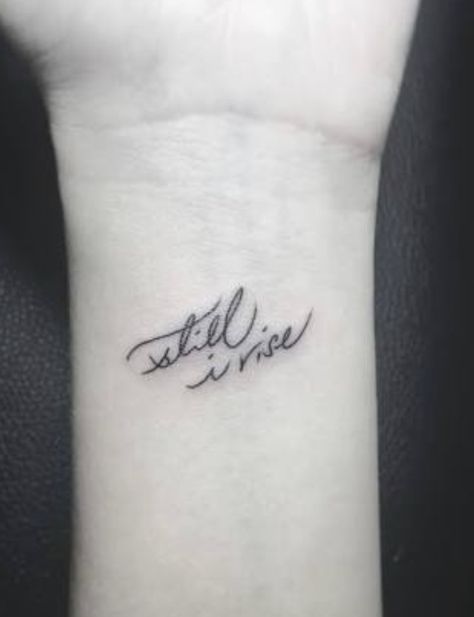 Watercolor Wrist Tattoo, I Rise Tattoo, Still I Rise Tattoo, Rise Tattoo, Henne Tattoo, Still I Rise, Small Wrist Tattoos, Wrist Tattoos For Women, Modern Tattoos