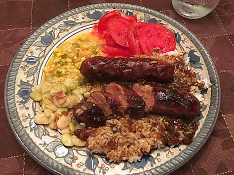 Smothered Cajun Fresh Sausage with Rice & Gravy Recipe Smothered Sausage, Sausage With Rice, Rice And Gravy, Sausage Rice, Lsu Baseball, Cajun Sausage, Pork Chops And Potatoes, Sausage Gumbo, La Eats