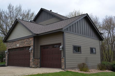 Hastings MN James Hardie Timberbark Lap Siding with Monterey Taupe Mixing Vertical And Horizontal Siding, Metal Siding With Stone, Taupe Siding, Vertical And Horizontal Siding Exterior, Hardi Plank Siding Ideas, Hardie Board Siding Ideas, Hardie Board Siding Colors, James Hardie Siding Colors, House Siding Options