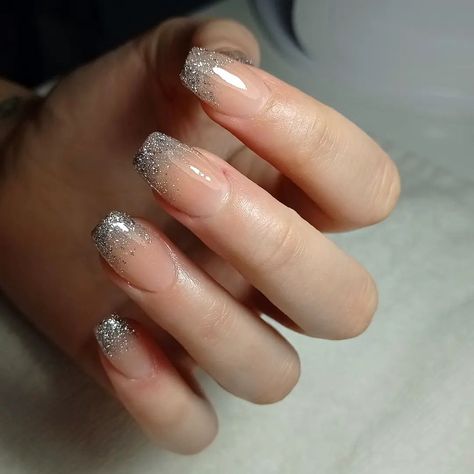 Natural nails with silver glitter on tips - Add some glitter to your french ombre manicure. Beautiful gradient nails with french tips and sparkles that you will love Silver French Tip Christmas Nails, French Gliterry Nails, Silver Gradient Nails, Gray Ombre Nails Short, Hombre Glitter Nails, Silver Tip Nails French Manicures, Natural Nails With Silver, Silver Shellac Nails, Silver Tips Nails