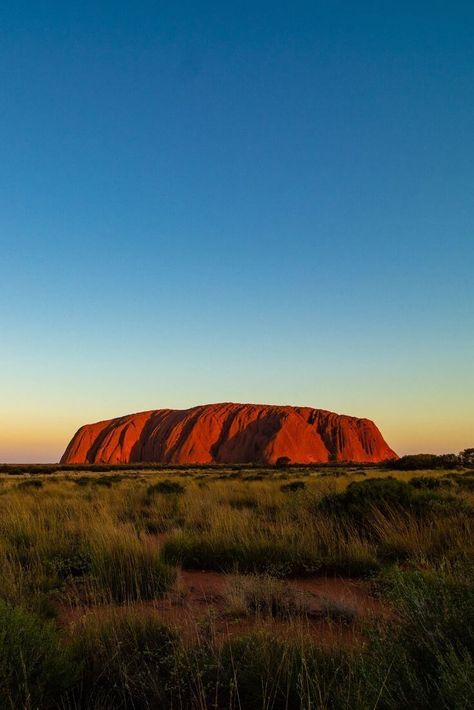 From a prison in Bolivia to the hottest place on earth in Ethiopia and everywhere in between, these are the six craziest places in the world where people really live. #UniqueTravel #TravelInspiration Ayers Rock Australia, Australia Wallpaper, Wallpaper Travel, Australia Landscape, Australia Itinerary, Rock Aesthetic, Ayers Rock, Australian Travel, Winter Wallpaper