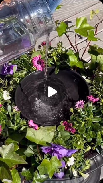 Noocx® - Smart Gadgets on Instagram: "DIY Garden Fountain 🌸 Great content by @jennifervalentyne. Follow her for more amazing content like this!
It’s so pretty and easy to do.
One large pot and a smaller one without holes for the centre. The bigger the pot or bowl on top the longer the water will last. Surround the edge with spring flowers and place the smaller pot in the center. I used a 10 inch serving bowl. A higher pot looks nice too. Fill with clean water and a solar water fountain. Mine is 6.3 inches wide.
It has to be a sunny ☀️ day in order to get the maximum water height and there are different water heads for multiple streams. 💦
#gardening #howto #diy #viral" Flower Pot With Solar Fountain, Solar Fountain Ideas, Diy Solar Fountain, Solar Water Fountain, Diy Water Fountain, Diy Garden Fountains, Fountains Backyard, Diy Fountain, Solar Fountain