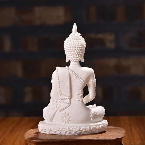 Featuring meticulous craftsmanship, the ArtZ® Buddha Statue exudes a sense of harmony, providing a serene atmosphere for any home or office. An excellent choice for gifting, this iconic symbol of peace adds a zen-like ambience. Height: 4.3 inch (11 cm) Width: 3 inch (7.5 cm) Depth: 2 inch (5 cm) Material: Resin and Sandstone Sandstone Garden, Concave Mirrors, Buddha Face, Sitting Buddha, Buddha Figurine, Uk Garden, Buddha Sculpture, Sacred Symbols, Garden Ornament