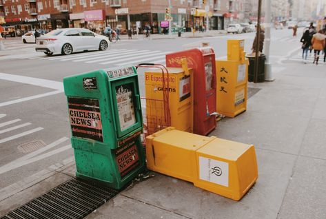 retro vintage aesthetic of a newspaper stand that collapsed and fell on the ground / sidewalk in Chelsea New York City streets. Colors of newspaper stand is yellow, green and red. could be a meme. shot on canon eos rebel 30 mm lens Newspaper Stand Aesthetic, Newsstand Aesthetic, New York City Streets, Retro Newspaper, Retro Vintage Aesthetic, Newspaper Stand, Vintage Newspaper, New R, Free Agent