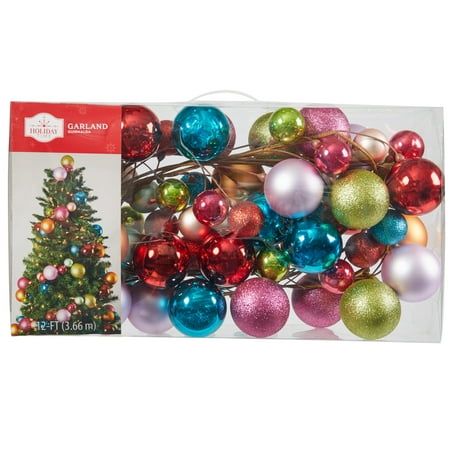 Add to your winter aesthetic this season with the Holiday Time Shatterproof Multicolor Ball Ornament Garland. This fully assembled garland features unbreakable ornaments in a variety of colors, sizes, and finishes. Use it to decorate your tree, hang it over your mantel, along your staircase, or on your door to greet your guests for the holidays. Celebrate the most wonderful time of the year by preparing your home for Christmas gatherings with our Holiday Time collection of products to help compl Using Garland On Christmas Tree, Holiday Door Garland, Old World Ornament Christmas Tree, Inflatable Ornament Decor, Christmas Tree Without Garland, Colorful Kids Christmas Tree, Colorful Eclectic Christmas Decor, Big Impact Christmas Decorations, Vintage Christmas Tree Garland