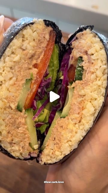 Keto Made Easy on Instagram: "SUSHI BURRITO! (ONIGIRAZU)🍣 🥪 Made by @low.carb.love  Have you tried this yet?  If you live a low carb lifestyle and you miss sushi, you have to try this!  All you need is: Cauli rice (my sushi cauli rice recipe) Tuna Light mayonnaise Sriracha Cucumber Red bell pepper Purple cabbage Avocado  Add any extra toppings you want!  That’s it… this came out so delicious and trust me, you don’t even miss the rice ❤️ . 📚✨ Elevate your keto journey with my brand new cookbook! 🥑Dive into a world of flavor and wellness with 500 mouthwatering keto recipes and an exclusive 8-week meal plan! 🌟 Whether you’re a seasoned keto enthusiast or just starting your low-carb adventure, this cookbook is your passport to delicious and wholesome meals.  - 👩‍🍳 From breakfast to dinn Keto Sushi Rolls, Low Carb Sushi Rolls, No Carb Sushi, Avocado Sushi Roll, Keto Friendly Sushi, Cauli Rice Recipe, Low Carb Sushi, Sushi Burrito, Burritos Recipe