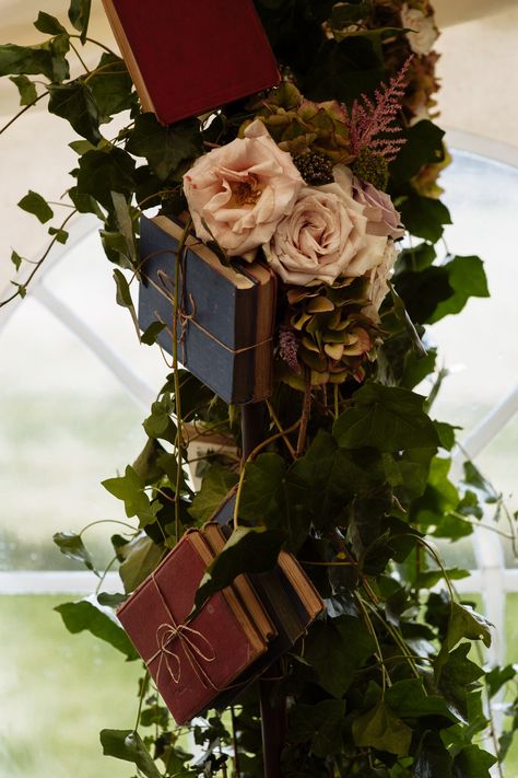 An arch decorated with vintage books and Roses , stunning www.simplyvintageevents.co.uk Book Arch Wedding, Book Themed Sweet 16, Book Lover Wedding, Book Inspired Wedding, Literary Wedding Theme, Library Themed Wedding, Rustic Library, Bookstore Wedding, Book Arch