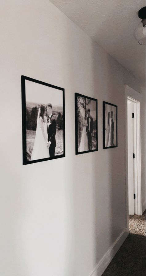 Living Room Family Portrait Wall Ideas, Black And White Photo Wall Hallway, Wedding Picture Wall Decor, Bedroom Decor Wedding Photos, Hanging Wedding Pictures In House, Living Room Wedding Photo Display, Wedding Photos Over Bed, Hanging Wedding Photos On Wall, Bedroom Couple Pictures