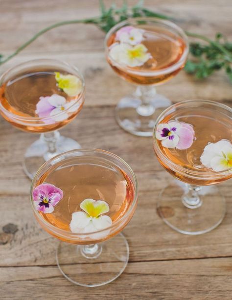 Champagne with fresh edible flowers Bridal Shower Drinks, Floral Drink, Floral Ice, Mumu Wedding, Floral Cocktails, Spring Celebration, Fortnum And Mason, Floral Bridal Shower, Wedding Cocktails