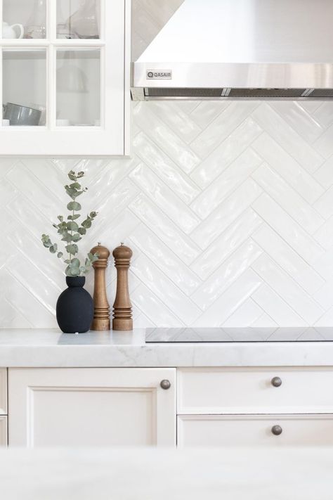 White Kitchen Backsplash Herringbone, Tile To Go With White Kitchen Cabinets, Herring Bone Kitchen Backsplash Ideas, White Quartz Countertop Herringbone Backsplash, Wall Holes Design Interiors, White Backsplash Kitchen Herringbone, Floating Shelf Tile Wall, Modern Transitional Kitchen Backsplash, Herringbone Backsplash With White Cabinets