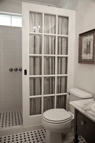 Instead of an expensive shower glass, this DIY-er used an old door he sealed to protect it from moisture. Brilliant! - Looks so much classier too! French Pocket Door, French Pocket Doors, Makeover Kamar Mandi, Jean Bag, Glass Shower Enclosures, Pocket Door, Trendy Home Decor, Shower Remodel, Pocket Doors