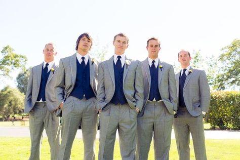 gray tux. navy vest and tie. | For the Gentlemen | Pinterest Grey Tuxedo Wedding, Dark Grey Tuxedo, Grey Tux, Groomsmen Tuxedos, Groomsmen Grey, Grey Tuxedo, Coral Tie, Navy Vest, Royal Blue Wedding