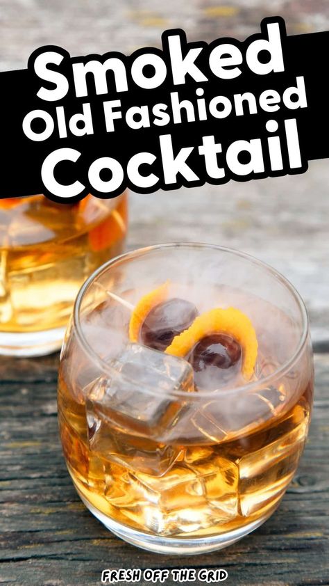 This Smoked Old Fashioned feels sophisticated, but it’s actually deceptively simple to make! The smoke, which lingers as you sip, lends an unmistakably woodsy note that pairs perfectly with the sultry-sweet flavors of bourbon and orange. Whether you’re looking for the perfect camping cocktail or just enjoying a quiet night at home, it just doesn’t get any more cool than a Smoked Old Fashioned! Smoked Maple Old Fashioned, S'mores Old Fashioned, Smoked Drinks Recipe, Smoked Old Fashioned Recipes Cocktail, Smoked Cocktails Drink Recipes, Smokey Old Fashioned Cocktail, Easy Old Fashioned Cocktail, Smoked Old Fashioned Cocktail, Camping Cocktails