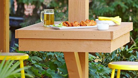 DIY patio table attached to a deck post. Outdoor Patio Tables Bar Height, Outdoor Table Stand, Deck Divider Ideas, Outdoor Bar Games, Deck Post Ideas, Under Deck Bar, Deck Post Wrap Ideas, Outdoor Deck Bar, Deck Bar Ideas