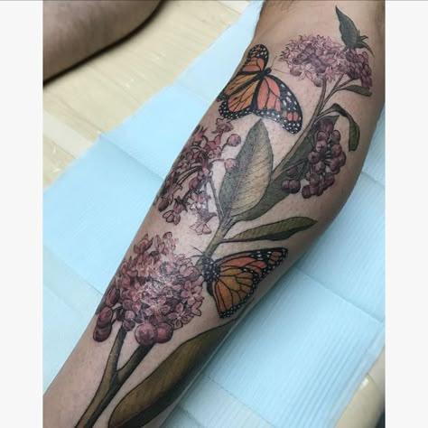 Monarch butterfly with milkweed tattoo, full color. Representing the facilitation of free migration. Monarch Flower Tattoo, Milkweed Flower Tattoo, Monarch And Flower Tattoo, Monarch Milkweed Tattoo, Monarch Tattoos, Butterfly Bush Tattoo, Monarch Butterfly Tattoo Thigh, Monarch Butterfly Tattoo With Flowers, Milkweed Tattoo