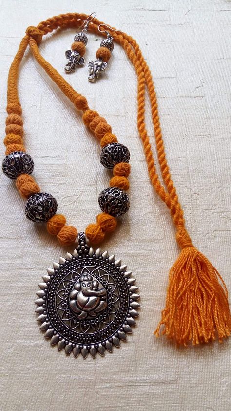 We design and make jewellery with utmost care and passion.. Customised design is also possible. Cotton Beads Jewellery, Oxidised Jewellery Making, Ball Jewellery, Tassel Jewelry Diy, Diy Earrings Materials, Diy Necklace Making, Earrings Diy Handmade, Macrame Colar, Diy Fabric Jewellery