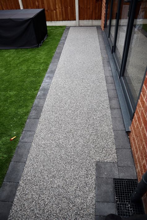 Charcoal edging paving with a Steel blue resin stone surface. A non slip, frost and weed resistant and very low maintenance garden path. Resin Patio Garden Ideas, Resin Back Garden Ideas, Grey Resin Driveway, Resin Patio Ideas, Front Walkway Landscaping, Front Garden Ideas Driveway, Garden Ideas Driveway, Driveway Entrance Landscaping, Modern Driveway