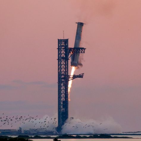 ICYMI: SpaceX made an impressive catch yesterday. The private launch company accomplished a groundbreaking engineering feat Sunday when it launched the fifth test flight of its gigantic Starship rocket and then caught the booster back at the launch pad in Texas with mechanical arms seven minutes later. This achievement is the first of its kind, and it's crucial for SpaceX's vision of rapidly reusing the Starship rocket, enabling routine access to space for mind-bogglingly massive payloads a... Spacex Starship, Nasa Photos, Rocket Scientist, Gas Giant, Rocket Launch, Sci Fi Tv, Classic Sci Fi, Launch Pad, Space Rocket