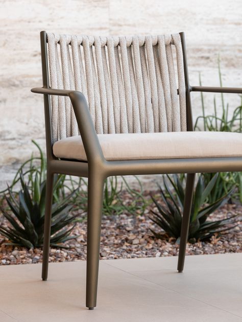 Named for the first letter of the word “hoy”—“today,” in Spanish—the H collection by Toan Nguyen takes a classic mix of materials for a new spin by adding enticing curves and finishes for a completely fresh look. Its 3-inch circumference rope creates a dramatic, sculptural effect against streamlined aluminum frames. The H Collection Arm Chair took home both the Dining/Bar Chair category and Best in Show at International Casual Furnishings Association's Design Excellence Awards 2021. Metal Outdoor Furniture, Outside Furniture, Rattan Armchair, Dining Chair Design, Modern Outdoor Furniture, Outdoor Furniture Collections, Outdoor Dining Furniture, Metal Furniture, Outdoor Dining Chairs