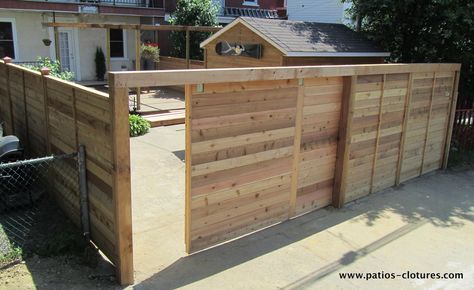 Single sliding door built in Verdun, Montreal. Sliding Fence Gate, Exterior Sliding Barn Doors, Door Fence, Kid Friendly Backyard, Diy Backyard Fence, Backyard Gates, Double Sliding Barn Doors, Interior Hardware, Sliding Gate