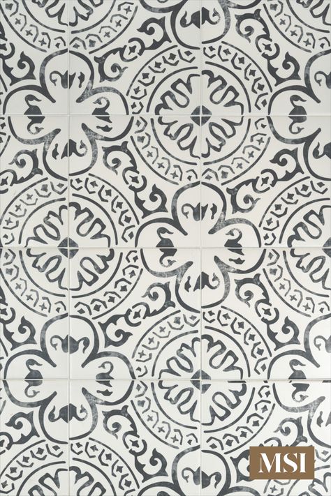 From our Kenzzi Porcelain Tile Collection, the Paloma tile features a beautiful graphic pattern in black and white. The pattern has nearly a vintage stamp like quality with lighter and darker shades of black highlighting the intricate design. Durable, easy to clean, and requiring no ongoing maintenance, they are perfect for countertops, floors, walls, and backsplashes even in the most active of homes. Black And White Patterned Tile, Patterned Tile, Black And White Pattern Tile Kitchen, Black And White Pattern Tile, Black White Spanish Tile, Hand Painted Tiles Kitchen, Black And White Encaustic Tile Bathroom, Black Wall Tiles, Graphic Tiles