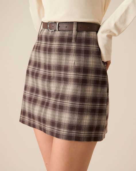 Fabric:This Plaid Mini Skirt is made of Polyester, Viscose, and Spandex. Polyester is an artificial fiber that feels soft, looks lustrous, and dries fast. Viscose (aka rayon) is a man-made cellulosic fiber made from wood pulp. It's soft, breathable, durable, and moisture-wicking. 
Description:This Brown Plaid Straight Mini Skirt offers a trendy and playful style. Its straight-cut design features a classic plaid pattern, perfect for adding a touch of flair to any outfit. Pair it with a cozy sweater or a fitted blouse for a chic, youthful look suitable for any casual occasion.
Details:- Occasion: Daily- Fabric Stretch: No Stretch- Pattern Type: Plaid- Embellishment: Zipper- Skirt Type: Straight- Dresses Length: Mini- Fabric: Polyester 67.0%, Spandex 3.0%, Viscose 30.0% Blouse Accessories, Fitted Blouse, Playful Style, Zipper Skirt, Long Bodycon Dress, Long Sleeve Knit Dress, Beige Dresses, Long Sleeve Short Dress, Straight Dress