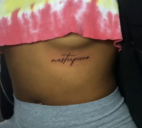 Lower Back Tattoo Quotes, His Masterpiece Tattoo, Masterpiece Tattoo The Word, Underbutt Tattoo Idea, Under Buttcheek Tattoo Black Women, Under Breast Tattoo Black Women, Under The Buttcheek Tattoo Women, Baddest Tattoos, Between Breast Tattoo Black Women