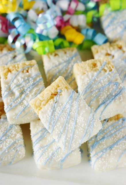 White Chocolate-Dipped Rice Krispie Treats ~ An & easy fun treat for a baby shower or ANY occasion! www.thekitchenismyplayground.com Winter Rice Krispie Treats, Winter Wonderland Rice Krispie Treats, Rice Krispies Dipped In Chocolate, Blue And Gold Rice Krispie Treats, Rice Krispie White Chocolate, Dipping Rice Krispies In Chocolate, Rice Krispie Treats Baby Shower Blue, Chocolate Dipped Rice Krispie Treats, Baby Shower Desserts Boy