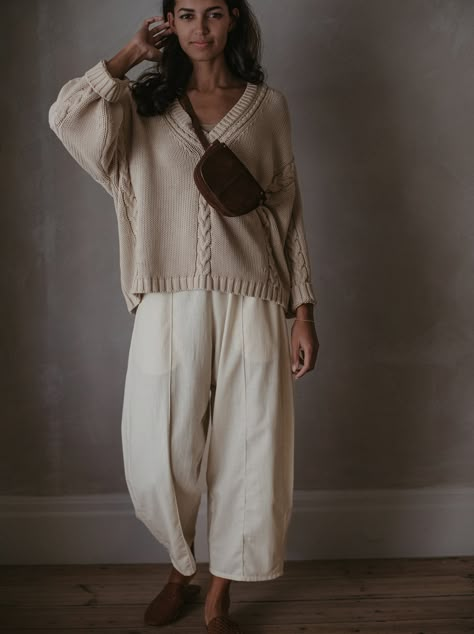 Crafted by artisans from soft, organic cotton voile, these trousers are effortlessly stylish and perfect for warm weather. Light and breathable with a relaxed, high-rise fit (with a comfortable elasticated waist) and a barrel-leg shape. Create the most gorgeous summer coord set with The Artisan Top, or layer with The Pullover for cooler days. • Composition: 100% organic cotton voile • Available in: CALICO • US sizes: XS (US 0–2), S (US 4–6), M (US 8–10), L (US 12–14), XL (US 16–18) • Made with l Summer Coord, Morocco Packing List, The Simple Folk, Coord Set, Wool Clothing, Organic Cotton Clothing, Loose Outfit, Organic Clothing, Comfy Fashion